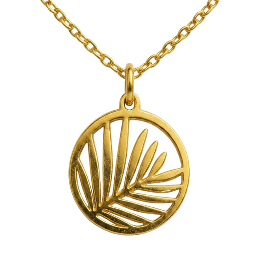 collier avec pendentif palmier en or 18k sur fond blanc